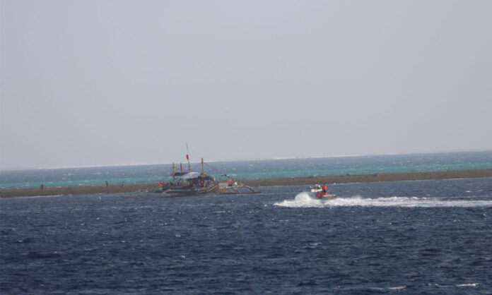 Penjaga Pantai Tiongkok mengambil tindakan untuk mengendalikan arah kapal Filipina